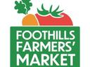 Logo with tomato, carrot, and greens above a green panel reading "FOOTHILLS FARMERS' MARKET"