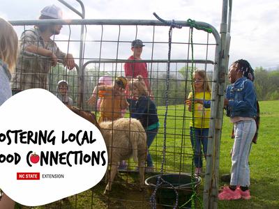 Children and adults petting a sheep behind a metal pen; text "Fostering Local Food Connections" and "NC State Extension"