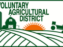 Voluntary Agricultural District Logo that features a cartoon image of a farm