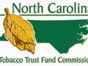 Text "North Carolina" above a state silhouette with a tobacco leaf and text "Tobacco Trust Fund Commission"