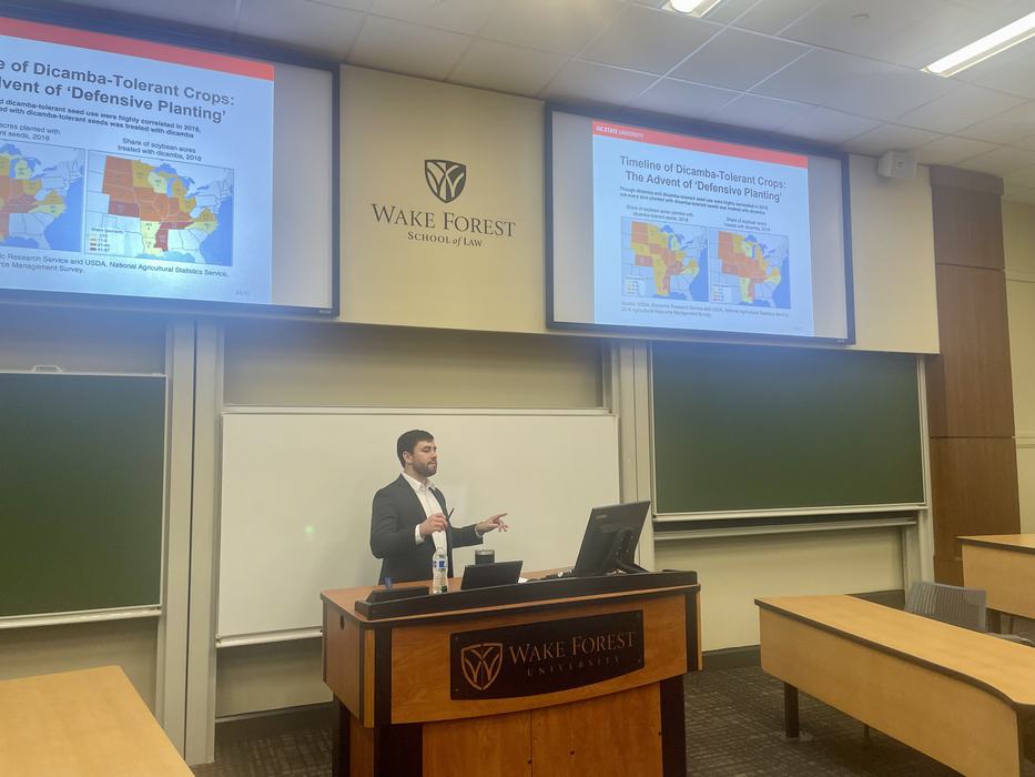A man gives a lecture at Wake Forest School of Law.
