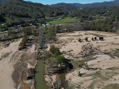 pasture land devastated by Hurricane Helene