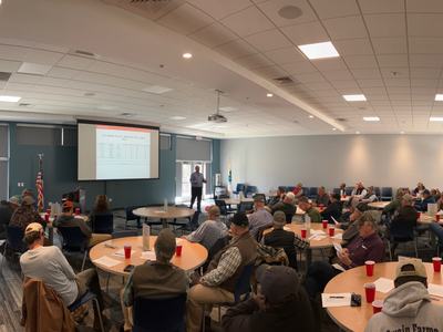 Farmers at a production meeting