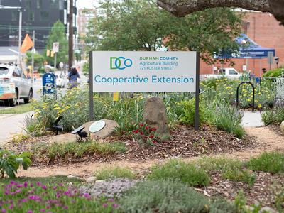 The Cooperative Extension sign in the demo garden
