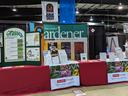 NC State Extension "Successful Gardener" booth with "Grasses" display and pamphlets.