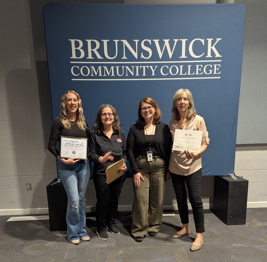 The Cheese Shop in Southport received a Platinum A Award. l-r Nichole Harding, owner of the Cheese Shoppe; Cheryle Syracuse, Safe Plates Instructor, N.C. Cooperative Extension; Alli Gray, Environmental Health Specialist and Lori Tucker also from The Cheese Shoppe received special recognition for her score on the Safe Plates Food Safety Manager Certification test.