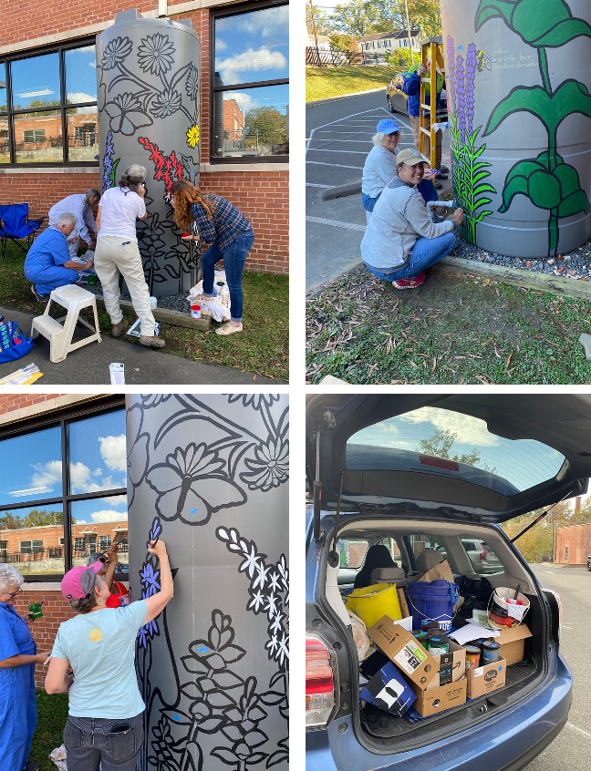 Master Gardeners painting the cisterns 