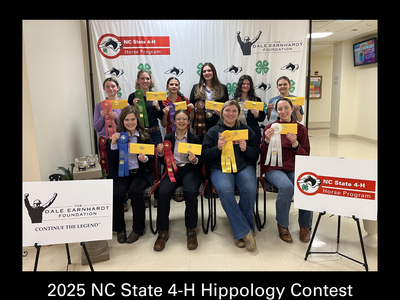Ten seniors with ribbons and envelopes at 2025 NC State 4-H Hippology Contest