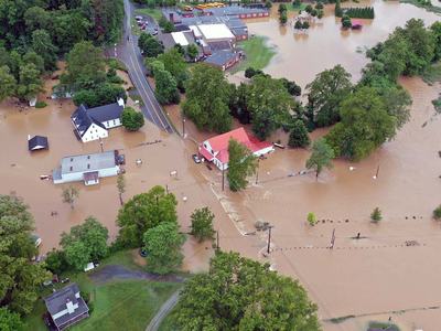 An aerial view of a flooded neighborhood in Watauga County, North Carolina, after Hurricane Helene devastated the area in late 2024.