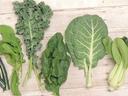 Photo of leafy greens including collards, kale, Swiss chard, et al.