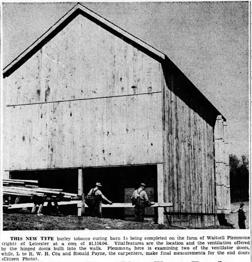 Black and white photo of a new burley tobacco barn in 1952.
