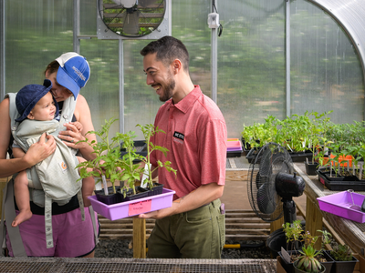 And man shows a child sprouts.