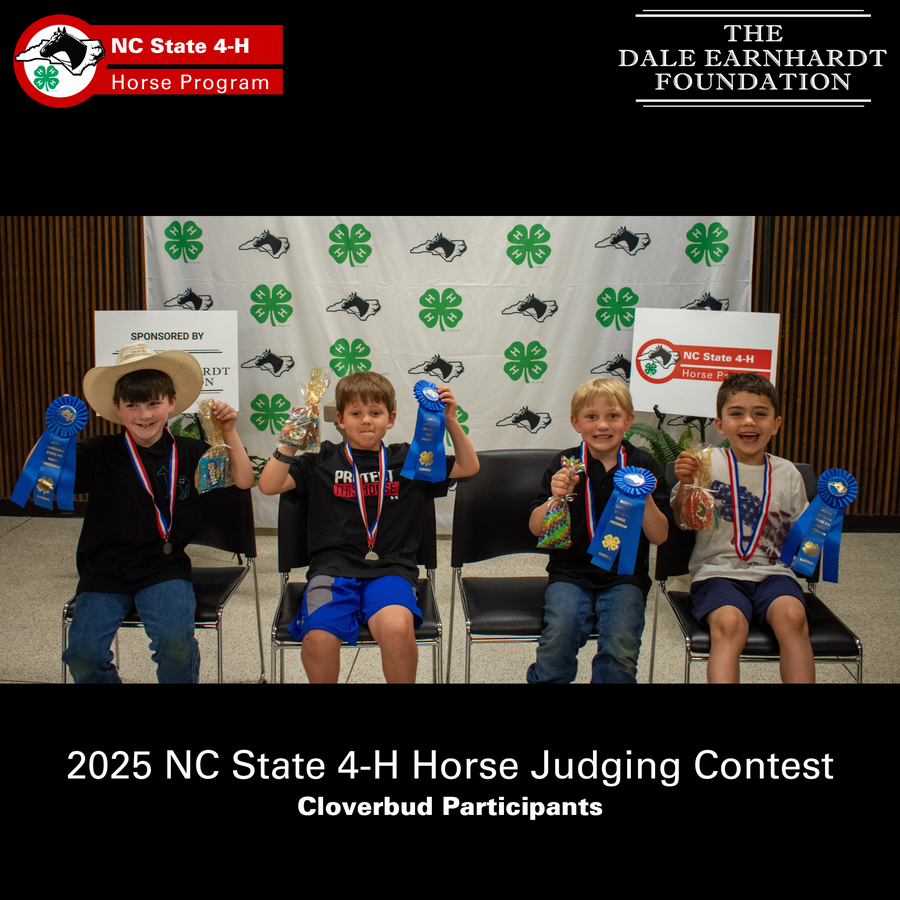 Four children seated holding blue ribbons and prizes at 2025 NC State 4-H Horse Judging Contest