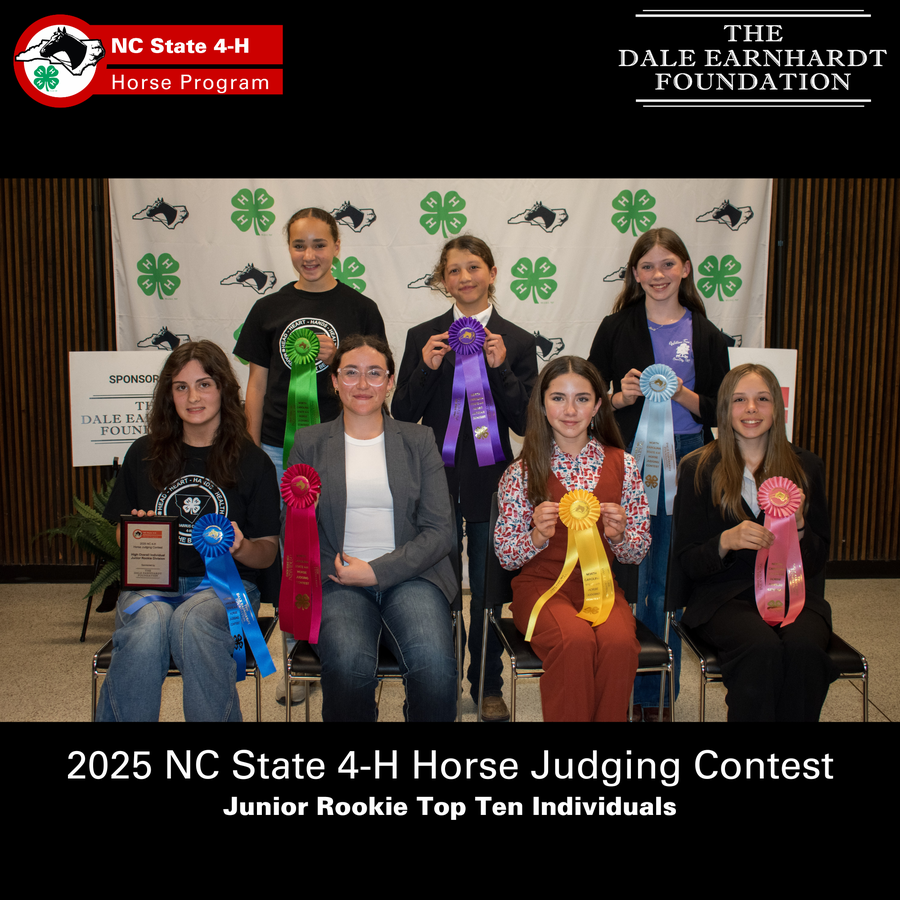 Seven youth holding award ribbons at 2025 NC State 4-H Horse Judging Contest