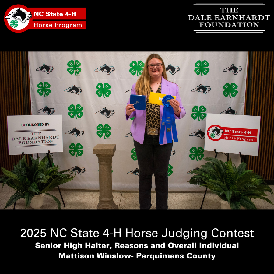 Person holding blue ribbon and certificate at 2025 NC State 4-H Horse Judging Contest backdrop
