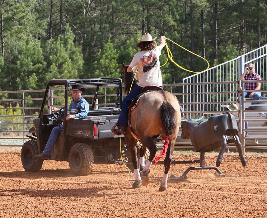 Horseback riders demonstrated their roping skills for the crowd at the Livestock Arena.