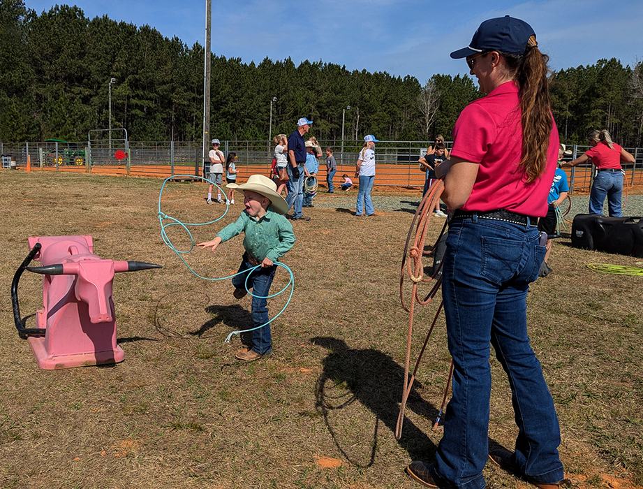 After everyone watched the horseback roping demonstration, the kids got a chance to practice their roping skills!