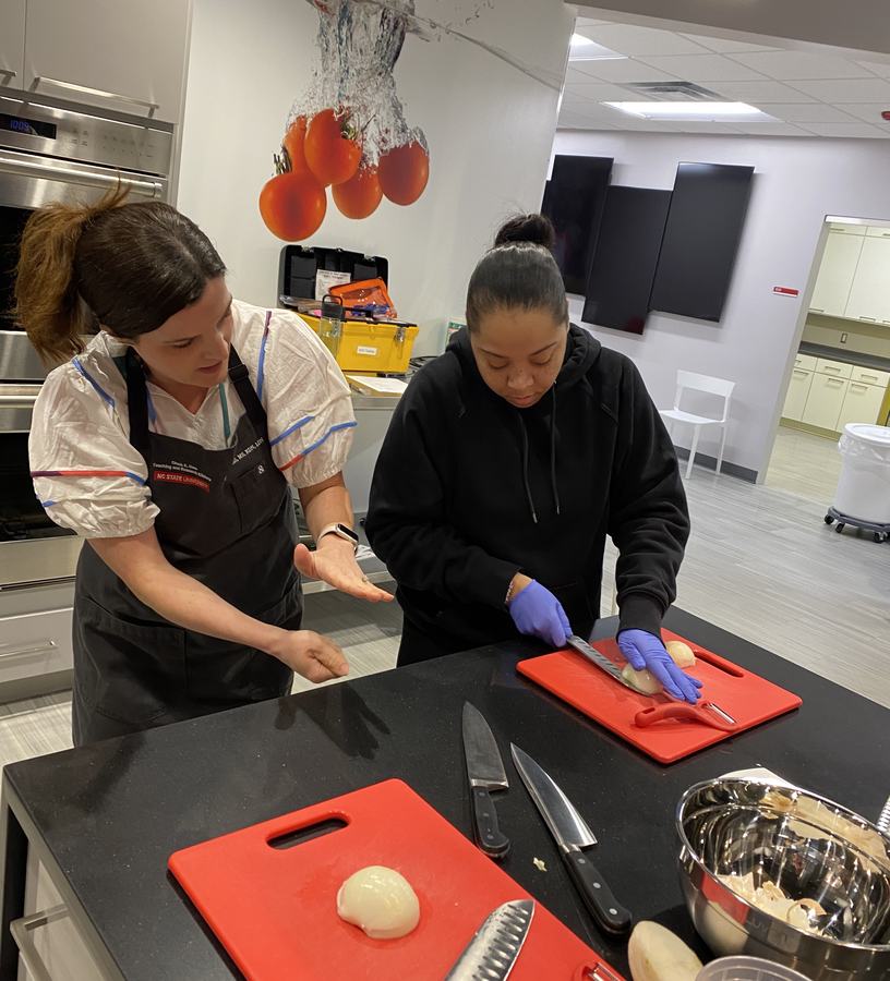 Catherine Hill teaching knife skills