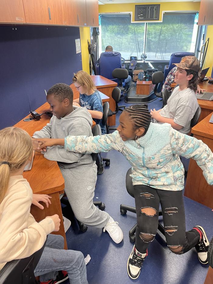 Children play inside the innovation station.