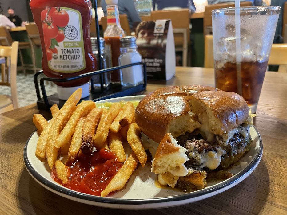 A nacho burger and fries.
