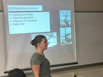 Maddie Pipes doing her presentation