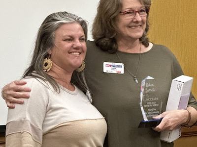 Julie and Roben Ex Board Award