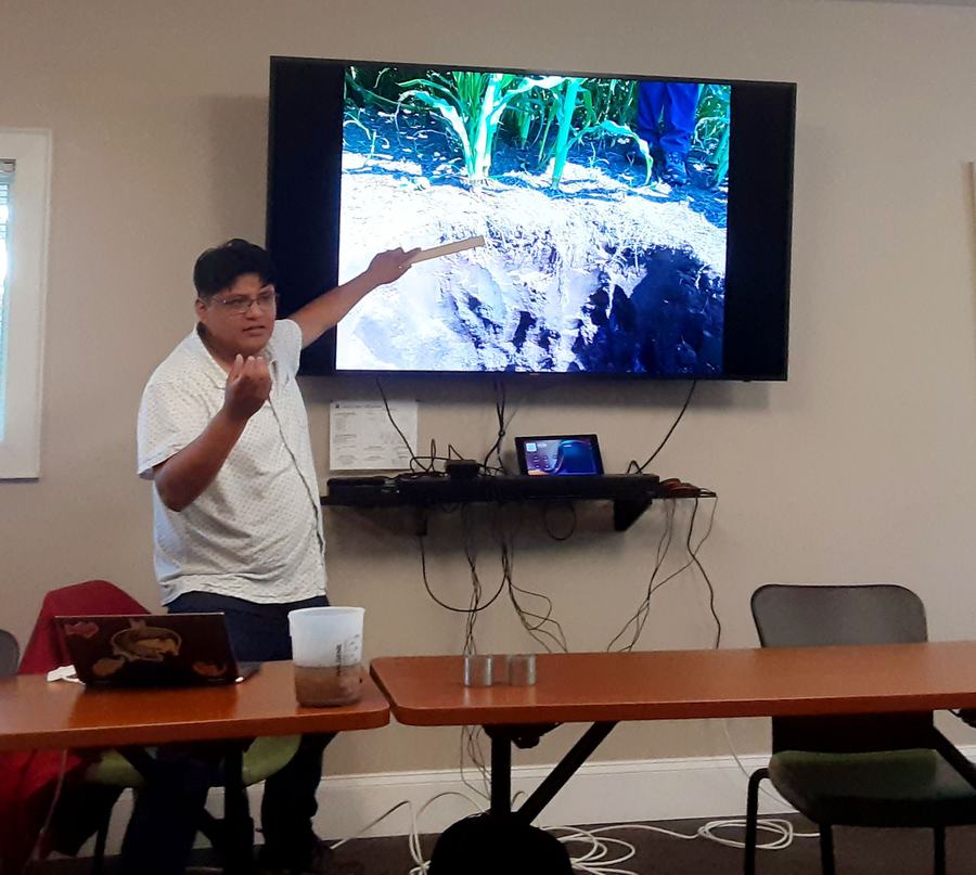 NC State University PhD student Alam Ramirez-Reyes leads the Soil Texture training workshop at Buncombe County Cooperative Extension. 