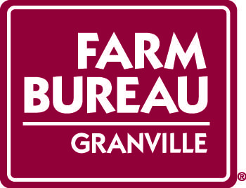 Maroon rectangular sign with white text: "FARM BUREAU" above "GRANVILLE"