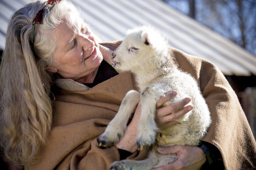 woman holding lamb