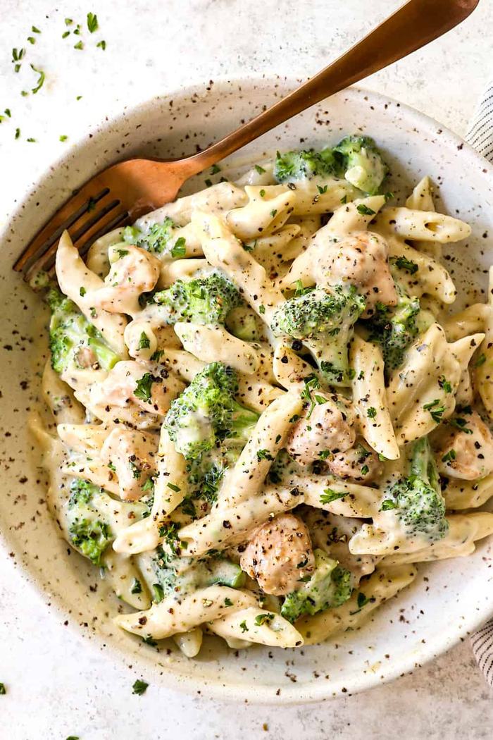 Broccoli and chicken pasta in a bowl.