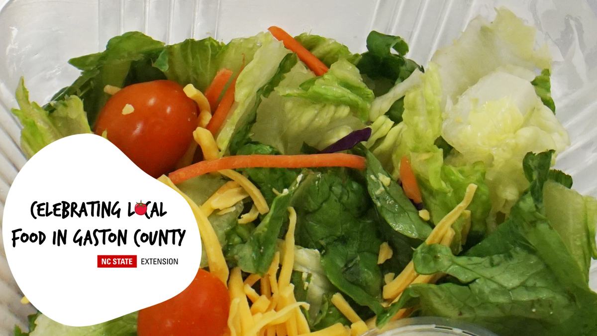 Salad with cherry tomatoes and cheese; badge: Celebrating Local Food, Gaston County (NC State Ext.)
