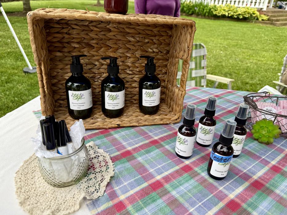 Lotions and sprays for sales at a farmers market.
