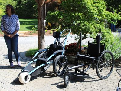 Two mobility devices in a garden.