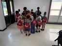 Lincoln Elementary students wearing their EFNEP draw-string bags after completing Eat Smart, Move More & Camp Cook Play