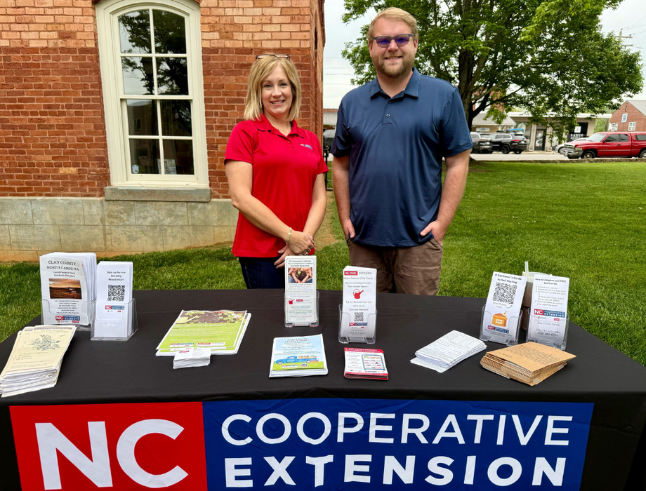 N.C. Cooperative Extension table set up at a farmers market.