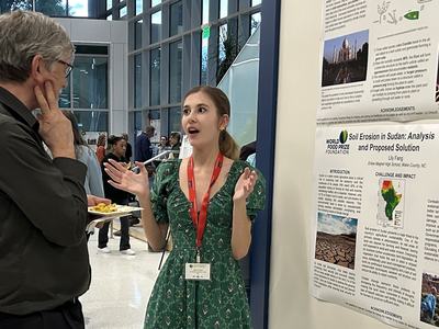 Claire Eveson, student sharing her global agriculture research