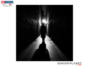 Silhouette of person in hat walking down narrow lit alley; logos: NC Extension; Senior Planet/AARP