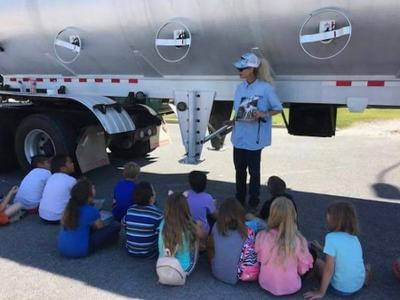 Mrs. Nancy feed truck driver