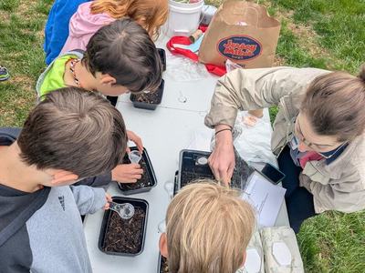 youth participating in outdoor STEM learning