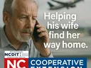 A worried man talks on the phone. Helping his wife find her way home.
