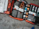 picture of first aid kit with other disaster preparedness items