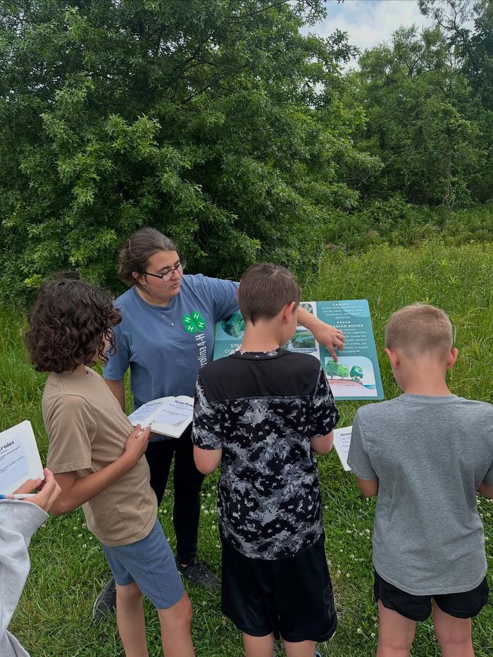Youth looking at sign