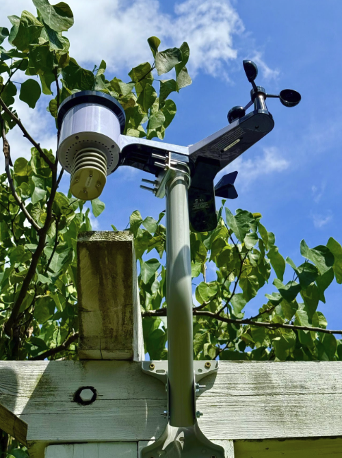 A new weather station affixed to a pergola. 