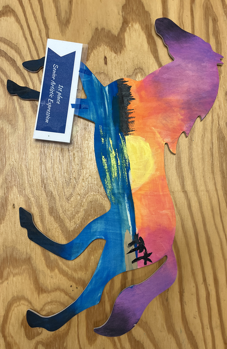 Horse-shaped painted wood with sunset beach scene; tag reads "1st place Senior Artistic Expression"