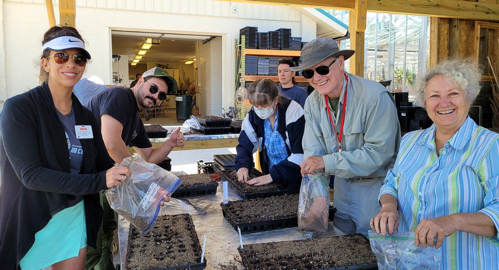 The EMG volunteer team potting seeds at Sarah P. Duke Gardens in Durham.