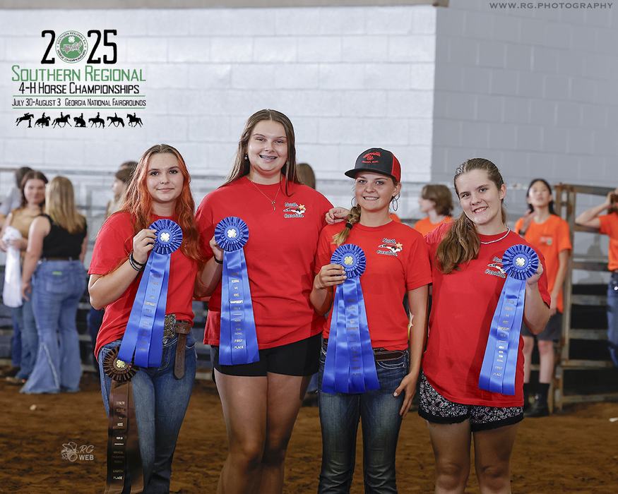 Four girls in red shirts holding blue ribbons at 2025 Southern Regional 4-H Horse Championships