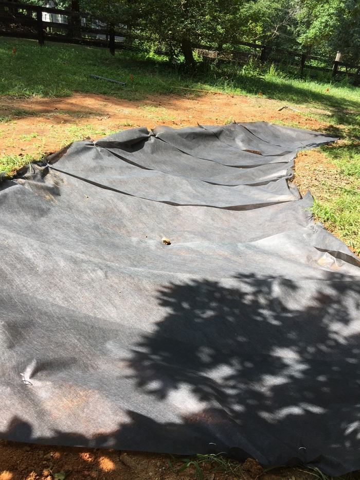 Tarp in a dug ditch to be covered in gravel.