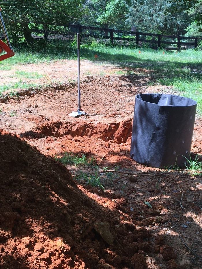 Clearing clay and dirt.