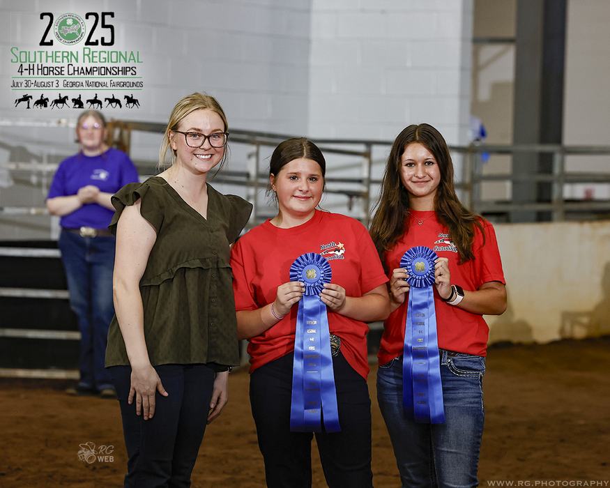 Three girls holding blue ribbons with 2025 Southern Regional 4-H logo