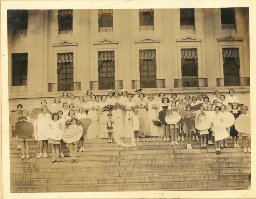 Youth learning about nutrition during a 1934 health day.